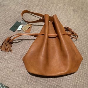 Tan bucket Francesca’s purse